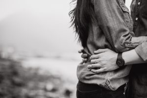 Newlywed holding his wife's waist